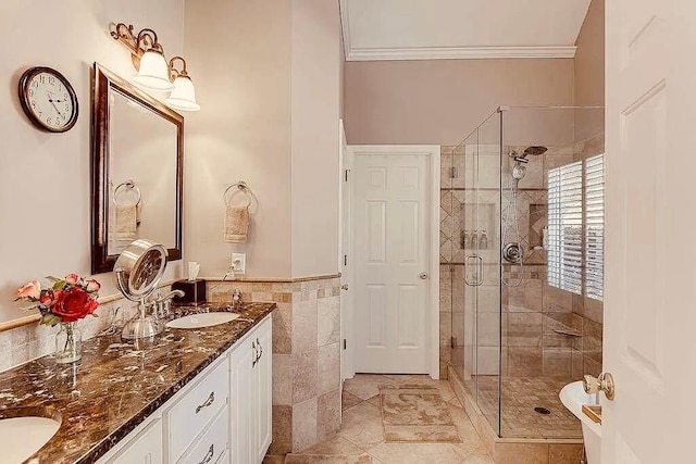 1739 Praters Pt, Dacula, GA 30019 - full bath with ornamental molding, a stall shower, tile walls, double vanity, and wainscoting