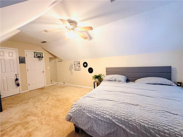 1739 Praters Pt, Dacula, GA 30019 - carpeted bedroom featuring baseboards, lofted ceiling, and a ceiling fan