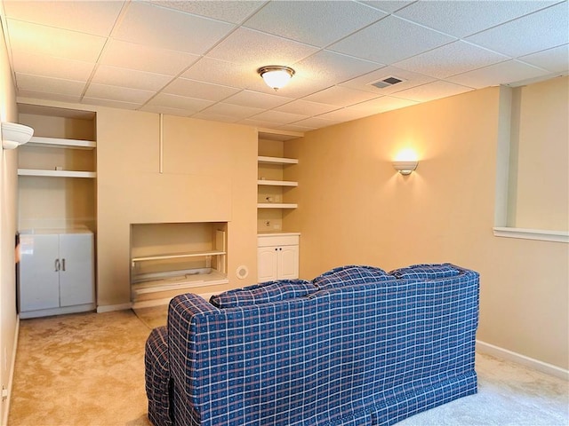 1739 Praters Pt, Dacula, GA 30019 - living area with carpet flooring, built in features, and baseboards