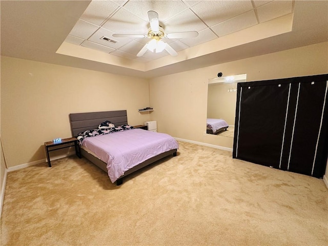 1739 Praters Pt, Dacula, GA 30019 - bedroom with a tray ceiling, carpet floors, baseboards, and a paneled ceiling