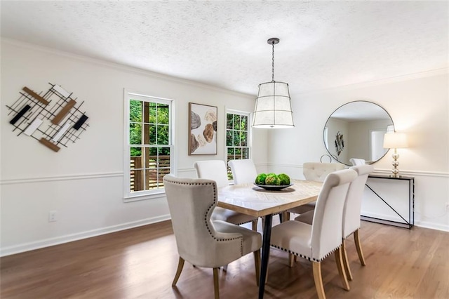 2015 Clipper Straits, Snellville, GA 30078 - dining room with ornamental molding, wood finished floors, and a textured ceiling