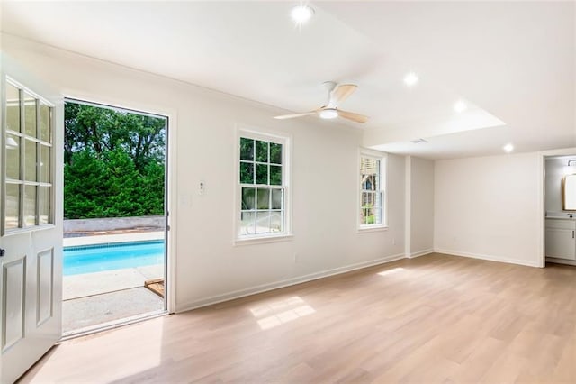 2015 Clipper Straits, Snellville, GA 30078 - unfurnished living room with light wood-type flooring, ceiling fan, and recessed lighting
