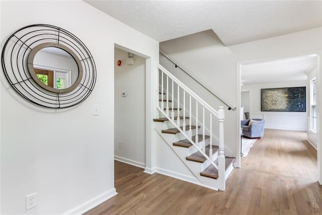 2015 Clipper Straits, Snellville, GA 30078 - staircase featuring wood finished floors and baseboards