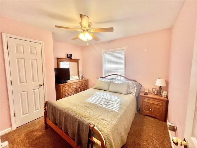 bedroom featuring carpet floors, ceiling fan, and baseboards