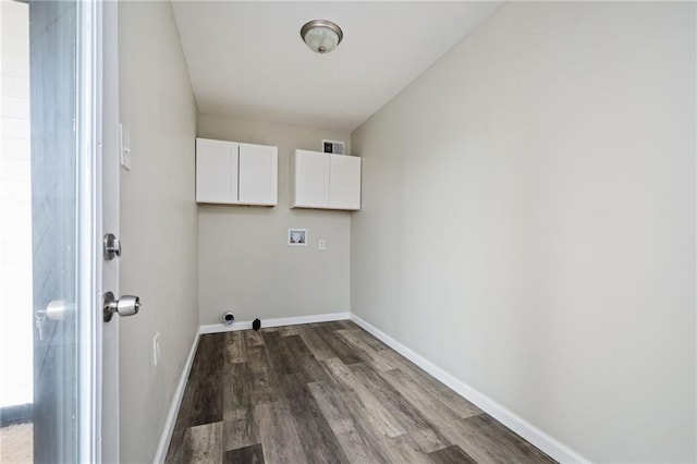 laundry room featuring baseboards, cabinet space, washer hookup, and dark wood-style flooring