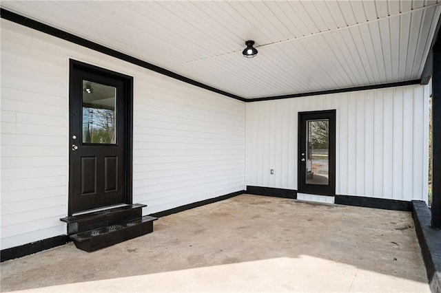 view of patio / terrace with an attached carport