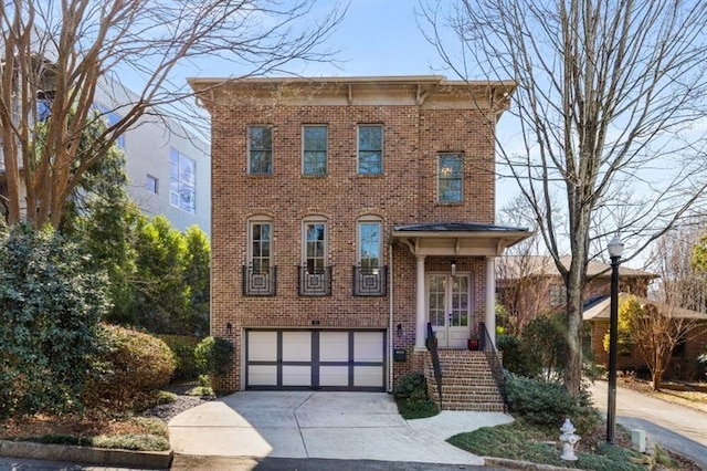 540 Woodall Ave NE, Atlanta, GA 30306 - italianate-style house featuring brick siding, driveway, and a garage