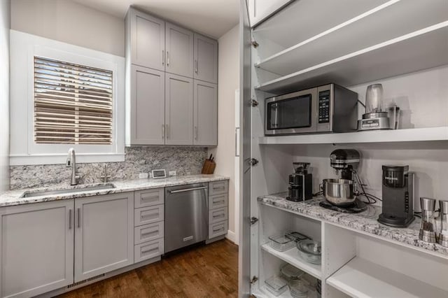 540 Woodall Ave NE, Atlanta, GA 30306 - kitchen featuring open shelves, appliances with stainless steel finishes, a sink, and gray cabinetry
