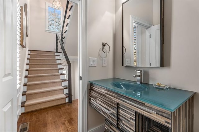 540 Woodall Ave NE, Atlanta, GA 30306 - bathroom featuring vanity, wood finished floors, and visible vents