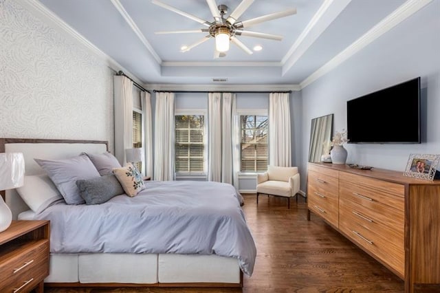 540 Woodall Ave NE, Atlanta, GA 30306 - bedroom with dark wood finished floors, wallpapered walls, a tray ceiling, a ceiling fan, and crown molding