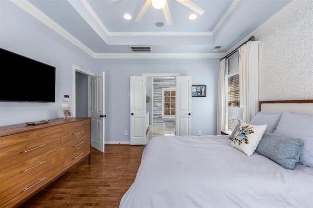 540 Woodall Ave NE, Atlanta, GA 30306 - bedroom with dark wood finished floors, a raised ceiling, baseboards, and ornamental molding