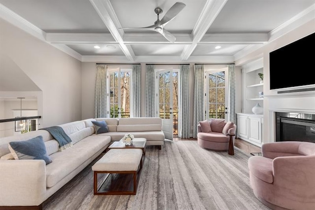 540 Woodall Ave NE, Atlanta, GA 30306 - living room featuring coffered ceiling, beamed ceiling, a ceiling fan, wood finished floors, and a fireplace