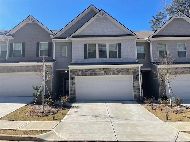 2314 Shetley Creek Dr, Norcross, GA 30071 - craftsman-style home with concrete driveway, an attached garage, and stone siding