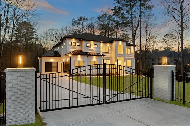 view of gate featuring a yard and a fenced front yard