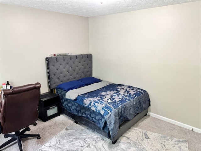 460 Heathrow Way, Stone Mountain, GA 30087 - carpeted bedroom featuring a textured ceiling and baseboards