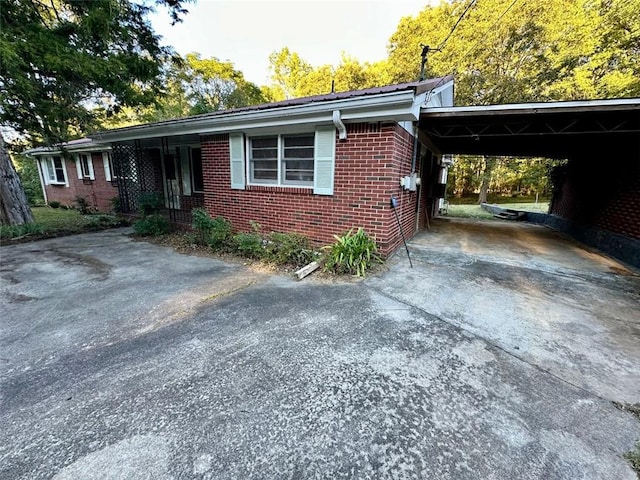 view of front of house with a carport