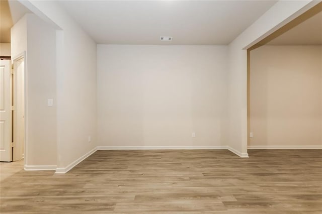 empty room with light wood-type flooring