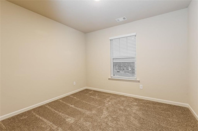 unfurnished room with carpet