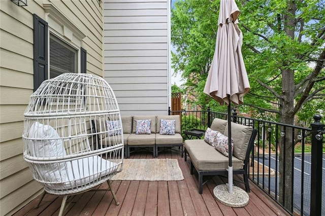 deck with an outdoor hangout area
