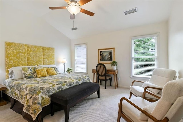 carpeted bedroom featuring a ceiling fan, baseboards, visible vents, and lofted ceiling