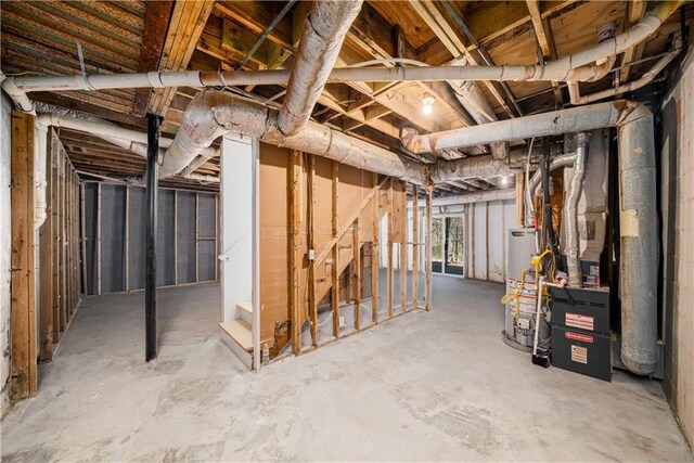 basement featuring water heater