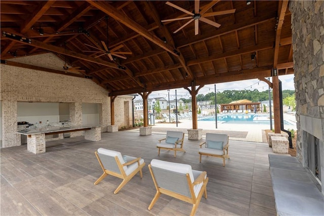 view of patio / terrace featuring a community pool