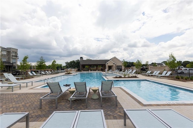 view of pool featuring a patio area