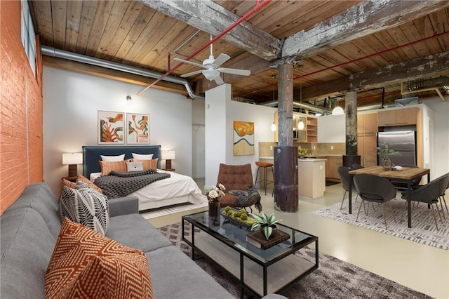 bedroom featuring wood ceiling, decorative columns, beam ceiling, and stainless steel fridge
