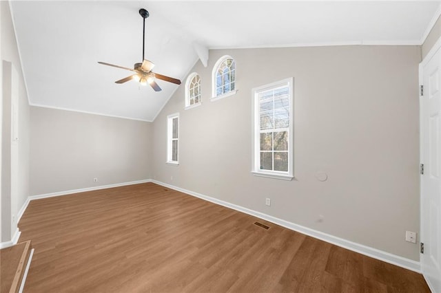 unfurnished living room with light wood-type flooring, baseboards, visible vents, and ceiling fan