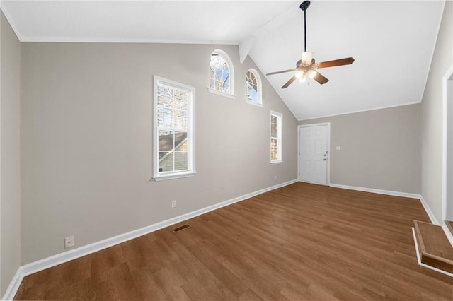 unfurnished living room with visible vents, baseboards, wood finished floors, high vaulted ceiling, and a ceiling fan