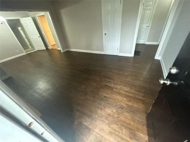 interior space with dark wood-type flooring