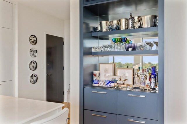 bar with blue cabinets