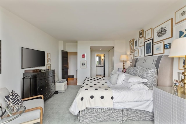 bedroom with light carpet