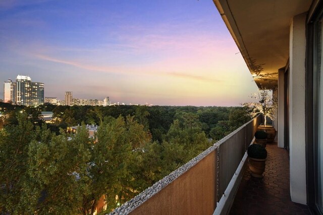 view of balcony at dusk