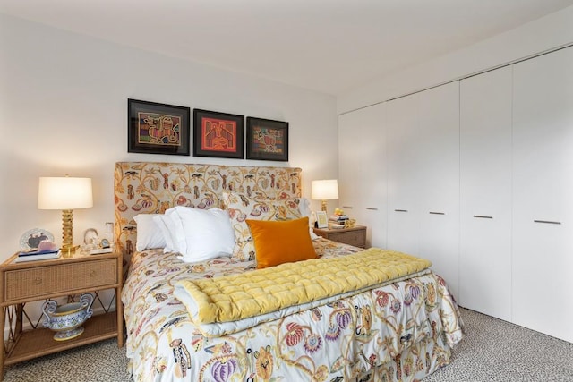 bedroom with carpet floors and a closet