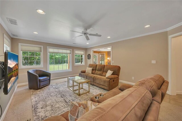 living area featuring baseboards, recessed lighting, a ceiling fan, crown molding, and carpet
