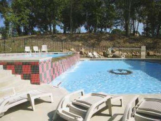 view of pool featuring pool water feature