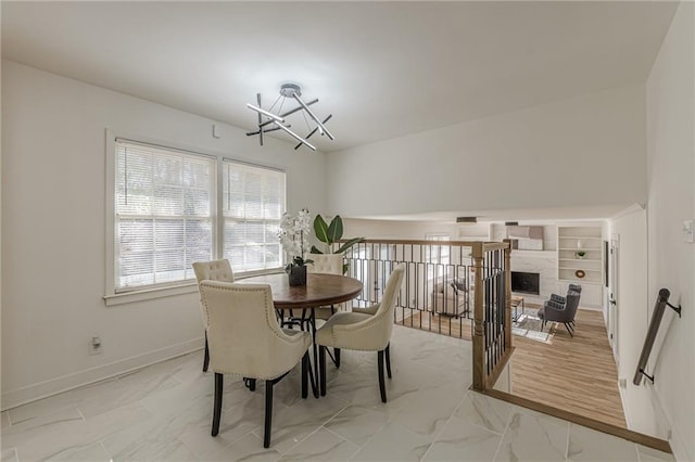 dining space featuring an inviting chandelier