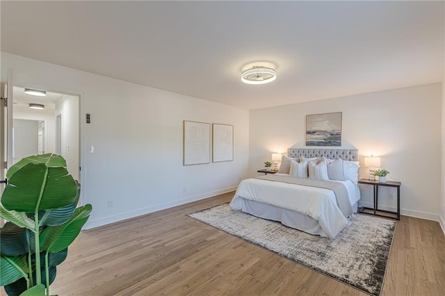 bedroom featuring light wood-type flooring