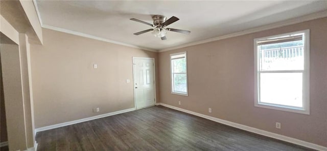 empty room featuring crown molding, ceiling fan, and dark wood-type flooring