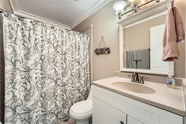 full bathroom with vanity, curtained shower, and toilet