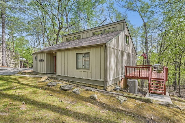view of outbuilding featuring central AC