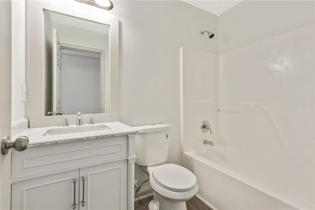 full bathroom featuring  shower combination, toilet, and vanity