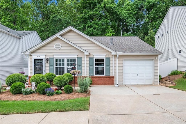624 Spanish Oak Dr, Acworth, GA 30102 - view of front of home featuring a garage, concrete driveway, roof with shingles, and brick siding