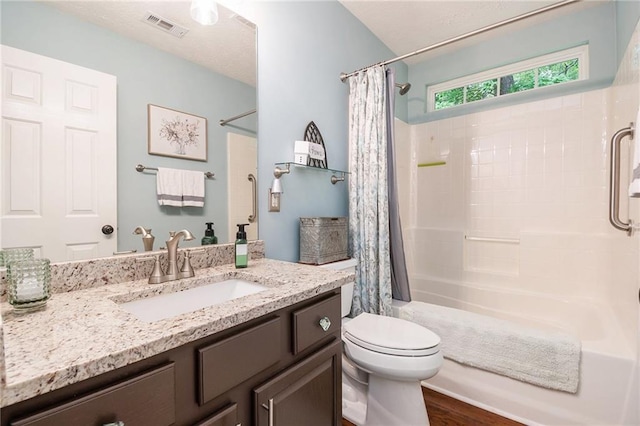 624 Spanish Oak Dr, Acworth, GA 30102 - bathroom with toilet, vanity, shower / bath combination with curtain, and wood finished floors
