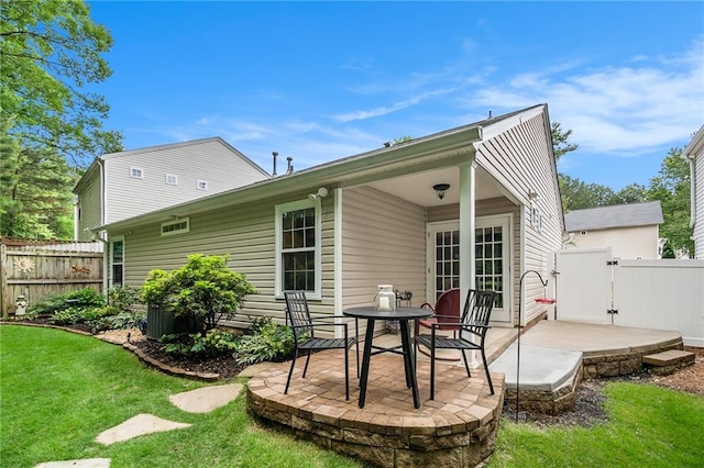 624 Spanish Oak Dr, Acworth, GA 30102 - rear view of house with a patio and a gate