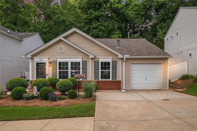 624 Spanish Oak Dr, Acworth, GA 30102 - view of front of house featuring driveway, an attached garage, a shingled roof, and brick siding