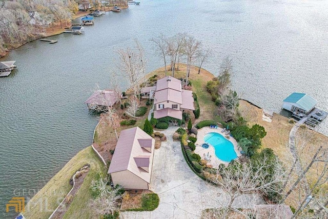 birds eye view of property featuring a water view