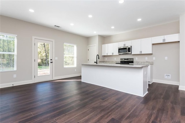 262 Stephens Rd, Cedartown, GA 30125 - kitchen featuring stainless steel appliances, white cabinets, baseboards, and recessed lighting