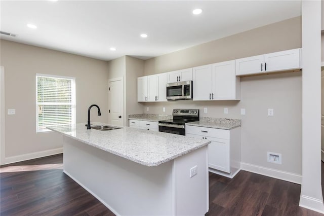 262 Stephens Rd, Cedartown, GA 30125 - kitchen with stainless steel appliances, a sink, baseboards, white cabinets, and recessed lighting